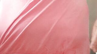 in the kitchen half-dressed