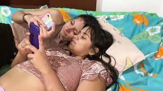 while we are checking the cell phone lying with my stepsister I ask her if she has been with a woman and so I teach her