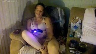 Busty Long Hair Gamer Girl In Bra and Panties Playing Smoking Cigarettes