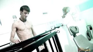 Blonde nurse watching a caged chick fuck with a patient