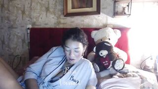 Ebony MILF slut fingers her holes with long nails