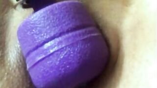 Beautiful wet cunt with big lips gets an orgasm from a vibrator and squirts wildly on camera close-up