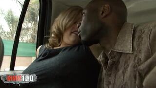 Chubby milf with giant natural boobs in a interracial porn scene