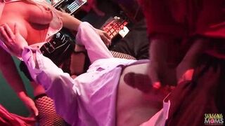 Two milfs in latex enjoy anal penetration in a threesome