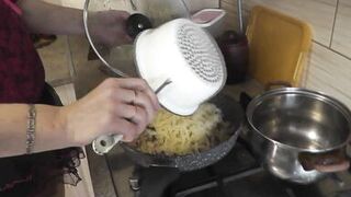 Mommy MILF without panties in stockings high heels continues nude cooking, shows pussy, boobs, nipples, butt and cooks pasta nautically  in kitchen. Ass pussy tits legs mom MILF