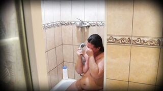 Mature BBW MILF in the shower. Peeping.