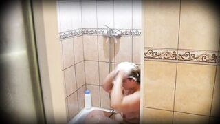 Mature BBW MILF in the shower. Peeping.