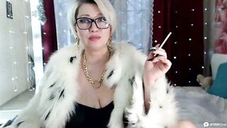 Gorgeous Russian mom smokes in a fur coat and dominates)) - 4 image