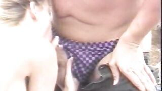 Tanned blonde and a dude are fucking on the beach