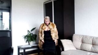 Hot sexy Russian MILF slut in a fur coat and a cigarette...