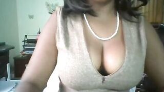 Ebony woman Macy with big tits on workplace