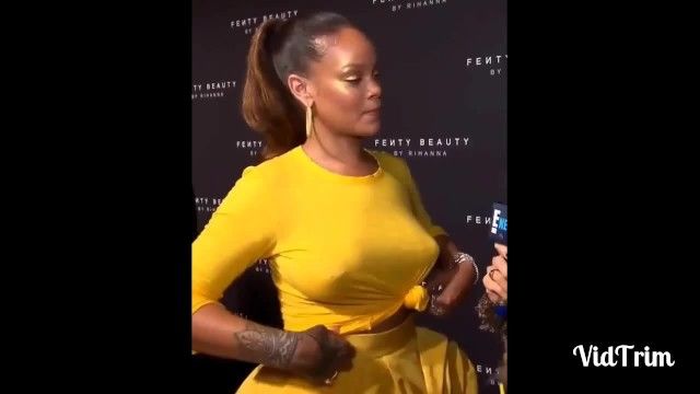 Braless Rihanna harte Nippel durchbohrten Nippel, die in der Öffentlichkeit Brüste hüpfen
